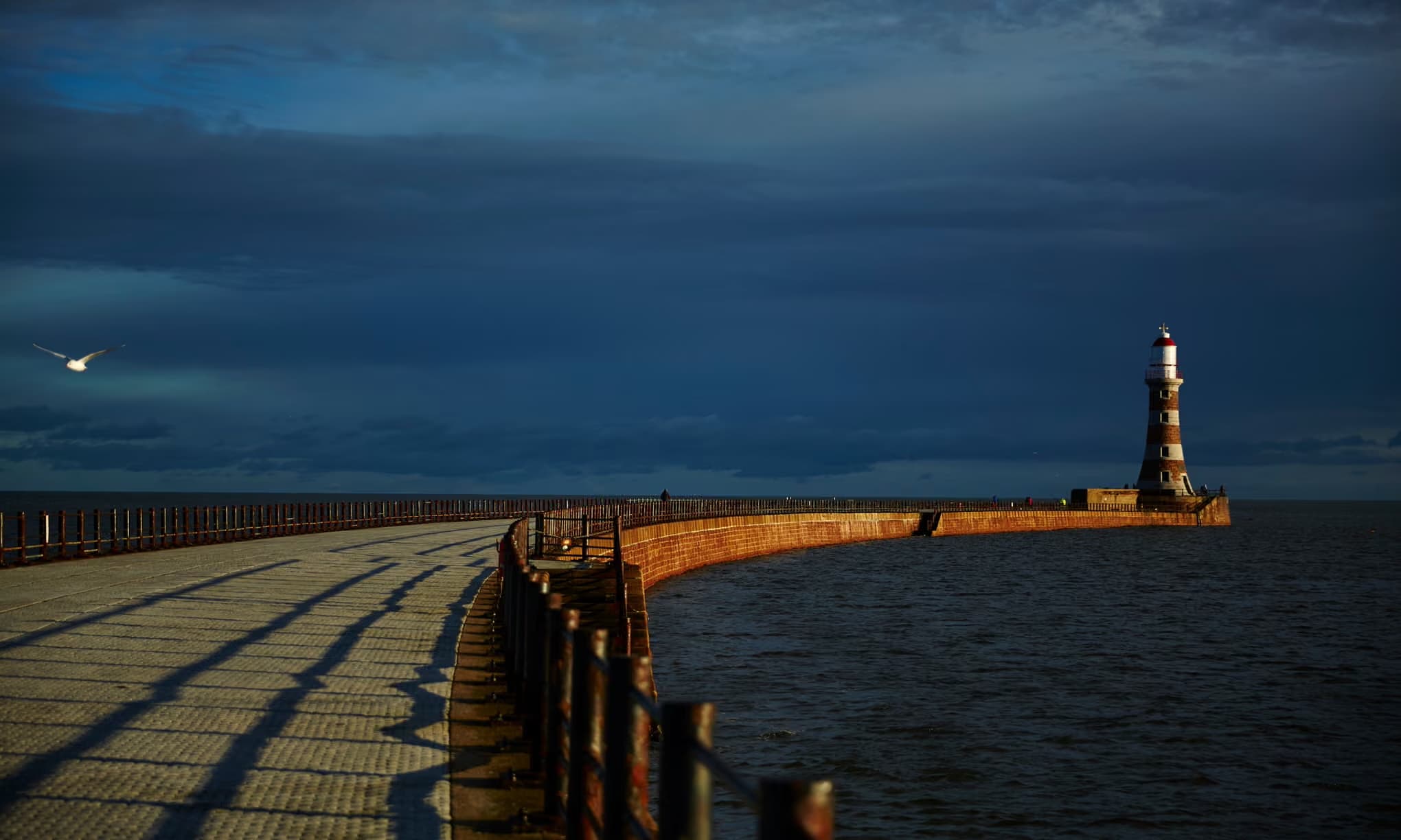 Roker Pier and lighthouse at dusk